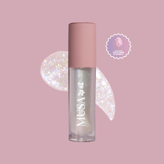 A clear glitter lip oil, with holographic glitter and cotton candy scent.#color_cotton-candy