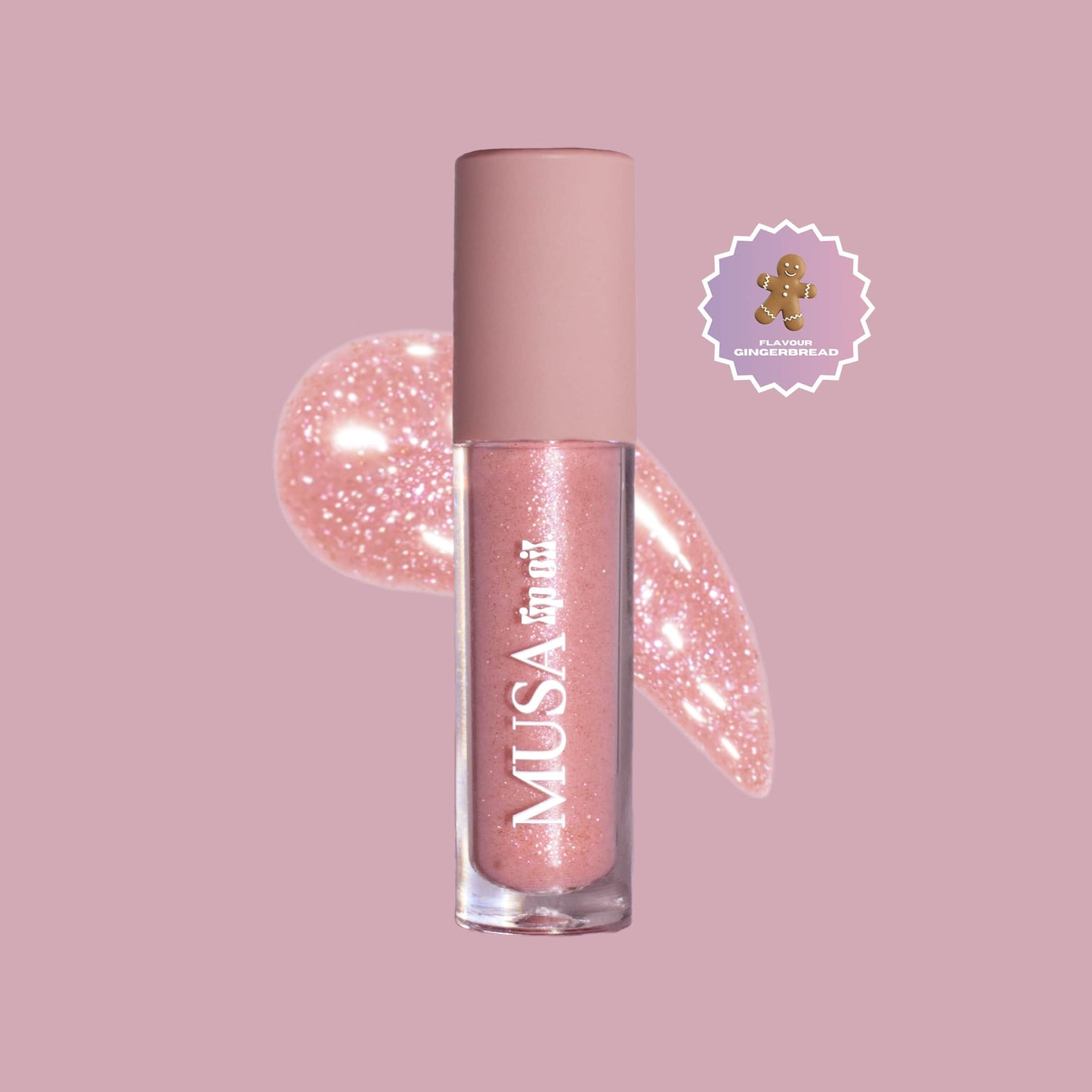 A pink glitter lip oil, with silver glitter and gingerbread scent.