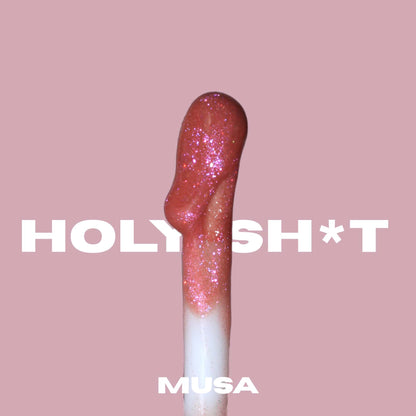 Soft and big applicator of a red glitter lip oil from Musa Glitter#color_siren