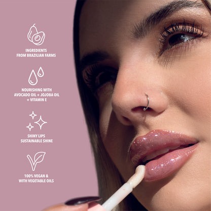 Benefits of the clear glitter lip oil. Made with avocado oil, vitamin E and jojoba oil. Vegan and Cruelty Free. Made with biodegradable glitter.#color_cotton-candy