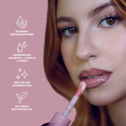 Benefits of the pink glitter lip oil. Made with avocado oil, vitamin E and jojoba oil. Vegan and Cruelty Free. Made with biodegradable glitter.#color_gingerbread